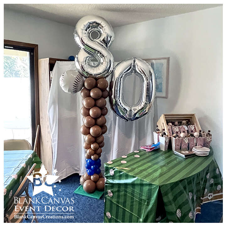 Baseball Bat Balloon Sculpture with a large #80 and a baseball balloon.