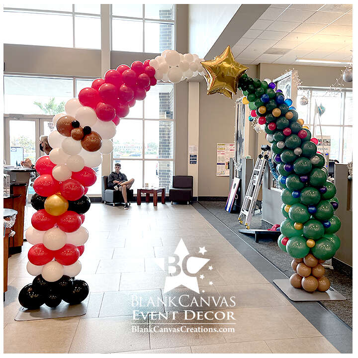 Back side of the Christmas Balloon sculpture Arch with an African American Santa Face