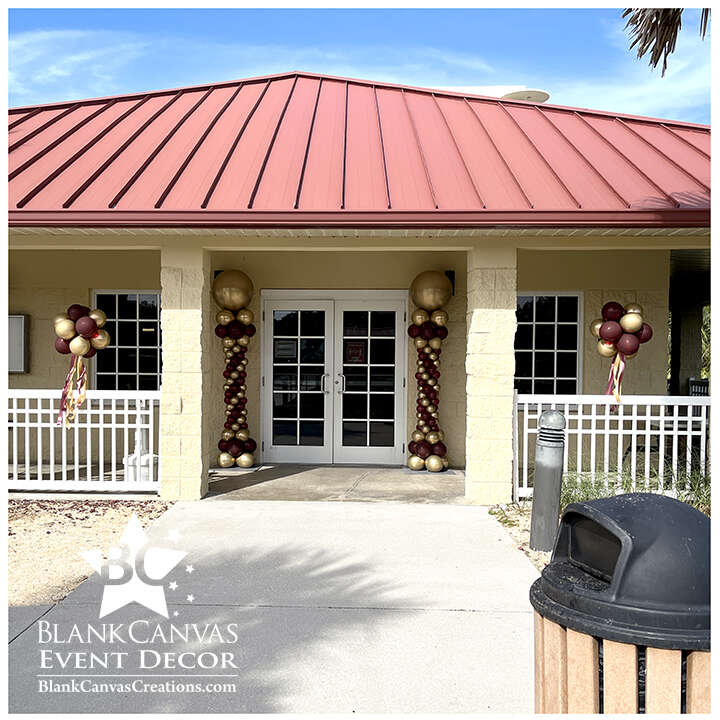 Chrome Gold and Maroon Roman Style Balloon Column outside the Canova Beach Clubhouse in Indialantic FL